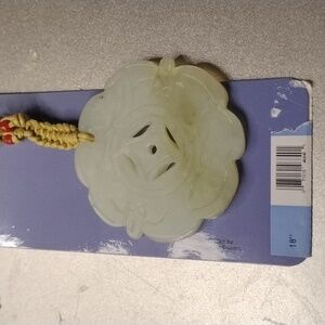 Carved stone necklace